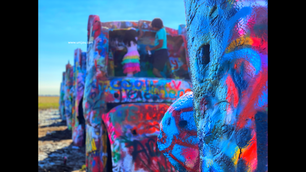 This image has an empty alt attribute; its file name is cadillac-ranch-photos11-1024x576.png